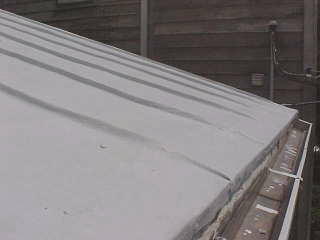 The edging is unique to he older metal panel roofs, not done today except by one manufacturer