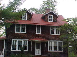 Front view of historic roof restoration project by Roof Menders