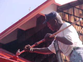 Roof Menders' crew have to work close to the standing seam panels