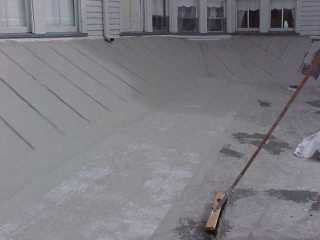 Roof Menders crew brush in the acrylic