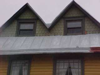 Another part of roof receives same treatment