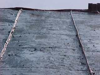 Example of extremely old crimped standing seam roofing
