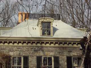 Roof Menders' foundation work finished for winter on winter metal roof restoration