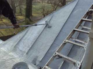 Roof Menders starts winter metal roof restoration project